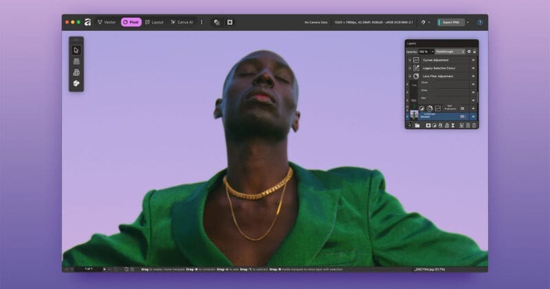A photo editing software interface displays a portrait of a person in a green jacket and gold chains against a purple sky background, with editing tools and adjustment panels visible on the screen. A photo editing software interface displays a portrait of a person in a green jacket and gold chains against a purple sky background, with editing tools and adjustment panels visible on the screen.