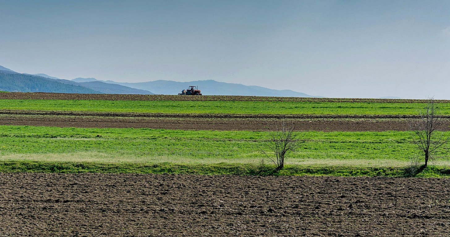 tractor ploughing field tractor ploughing field