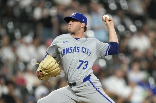 Kansas City Royals pitcher Sam Long delivers during the ninth inning of a baseball game against the Chicago White Sox on Tuesday, July 30, 2024, in Chicago. (AP Photo/Charles Rex Arbogast)