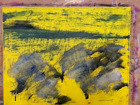 3 photos showing the growth of a painting strating with a yellow background, then with some grey marks, to a final rocks on a beach scene