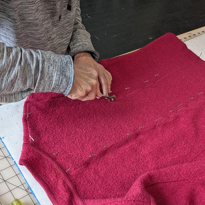 a pattern being made, a fabric design sample and garment made from the pint