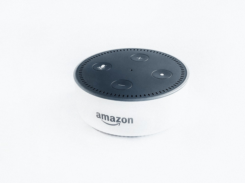 white and black Amazon Echo dot white and black Amazon Echo dot