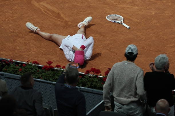 Poland's Iga Swiatek reacts to beating Belarus' Aryna Sabalenka during the 2024 WTA Tour Madrid Open tournament final tennis match at Caja Magica in...
