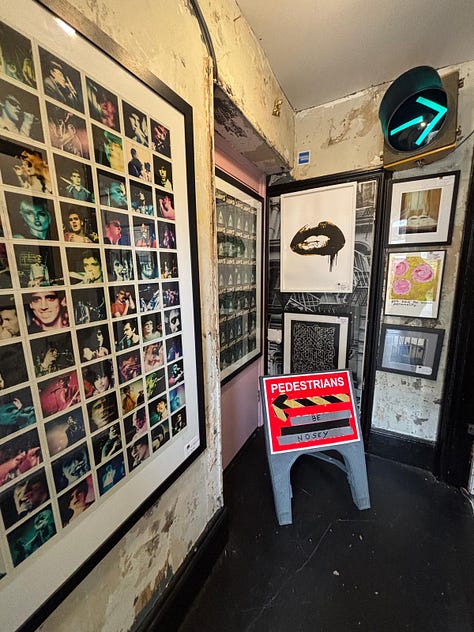 From a quiet street in Deal to the narrow hallway and intimate rooms beyond, the Walk Don't Walk Gallery invites visitors to step inside, be nosey, and discover an art space where humour, conversation and curiosity shape the experience as much as the works on the walls. — © Kent Chronicles