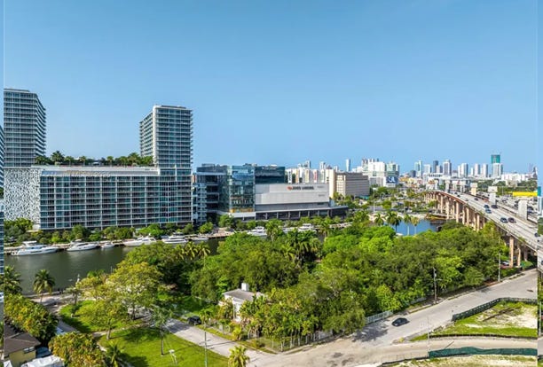 A city with trees and buildings

AI-generated content may be incorrect.