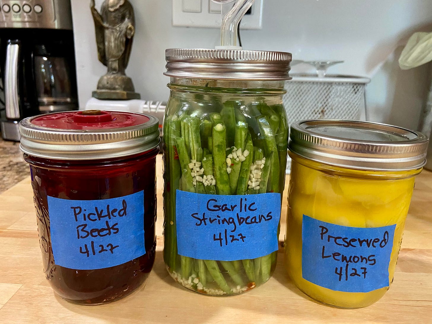Three jars of fermented vegetables