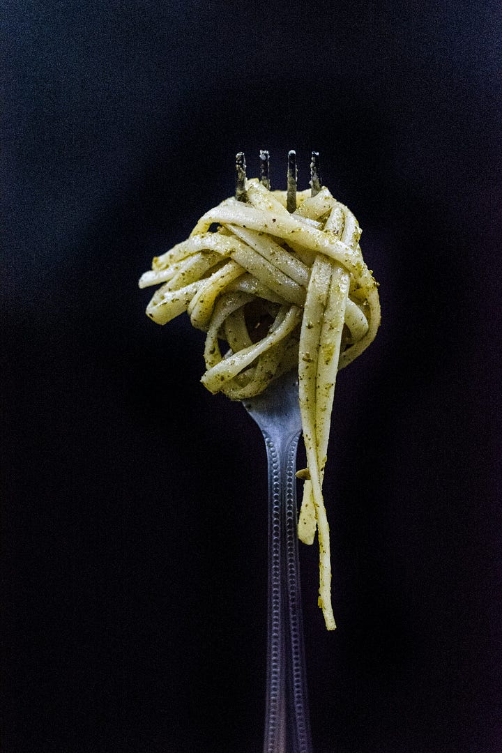Pasta on a fork. Olive oil with tomato bread. Photos by Alice Pasqual and Calum Lewis via Unsplash.