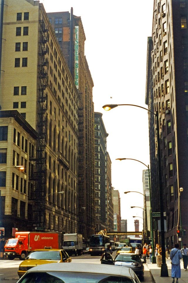 Dearborn Street looking south, bustling in front of Federal Plaza, Chicago, July 1996. Dearborn Street looking south, bustling in front of Federal Plaza, Chicago, July 1996.