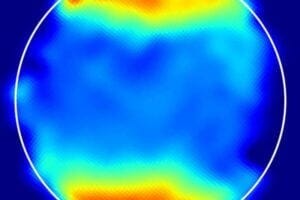 A spectroscopic map of Ganymede derived from JWST measurements shows light absorption around the poles characteristic of the molecule hydrogen peroxide. The circle outlines the surfaces of the moon.