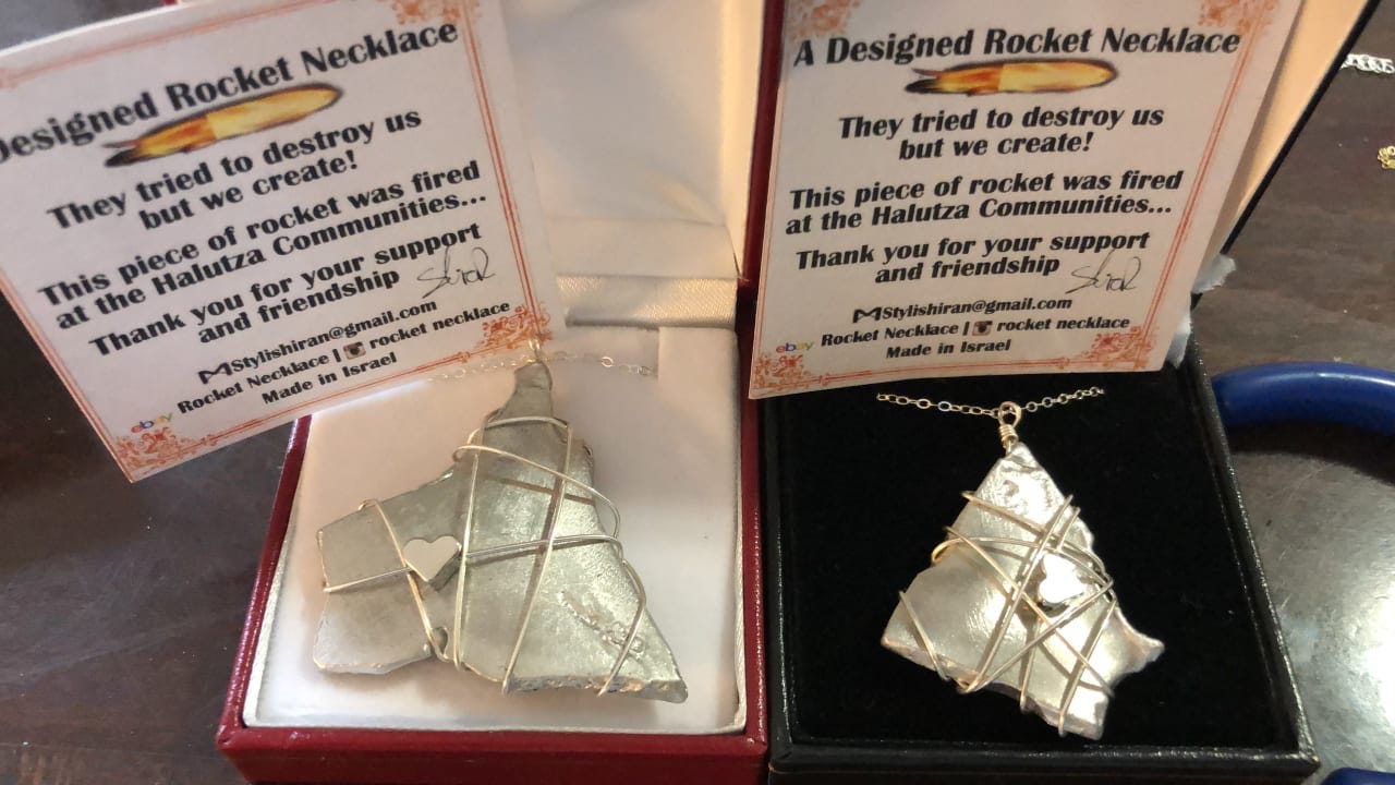 Necklaces made from rocket shrapnel by Yedidya and Shiran Harush (Credit: Rocket Necklace) Necklaces made from rocket shrapnel by Yedidya and Shiran Harush (Credit: Rocket Necklace)