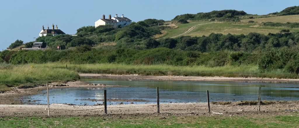 Coastguard Cottages at Cuckmere Haven by murder mystery author Robert Crouch