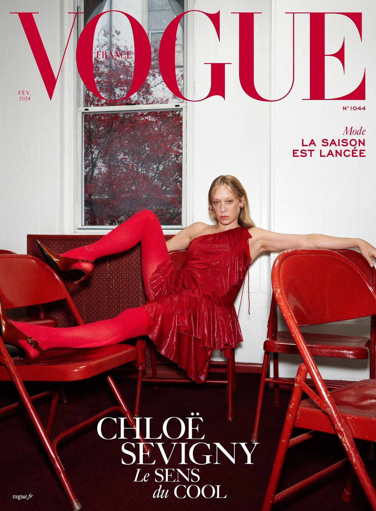 Chloë Sevigny wears ruffled dress BURBERRY Dune patent leather slingbacks SAINT LAURENT by ANTHONY VACCARELLO and tights...