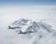 A pair of jets flying over a snowy mountain

AI-generated content may be incorrect.