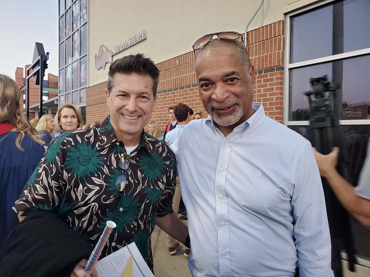 May be an image of 3 people and people standing