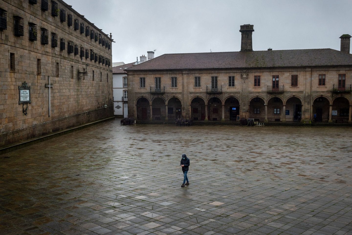 Covid public plaza one person walking