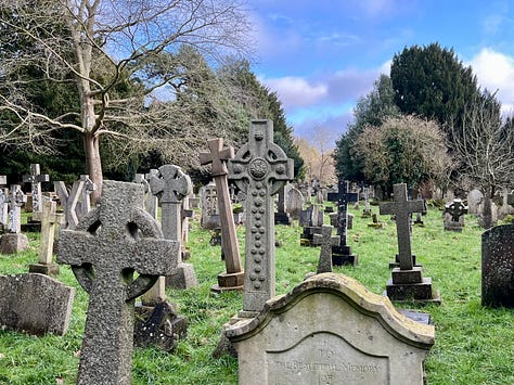 first photo of old headstones in grass filled cemetery, second photo light blue carved door set into a stone archway, third photo of theatre pre-set curtain which is Tina Turner's face but only really her eyes