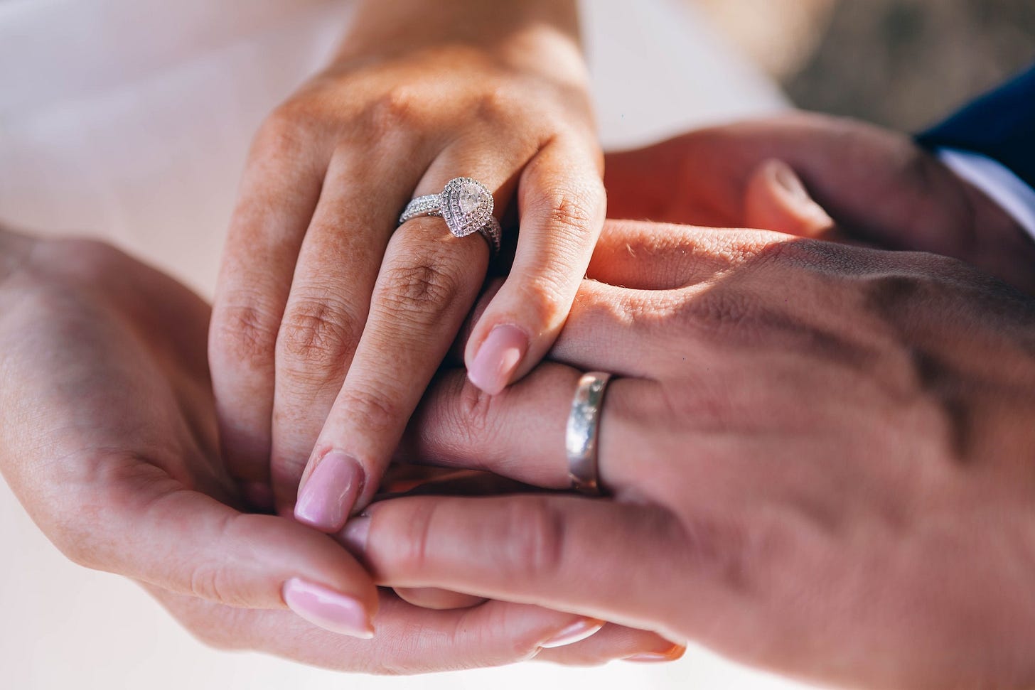 People wearing wedding rings