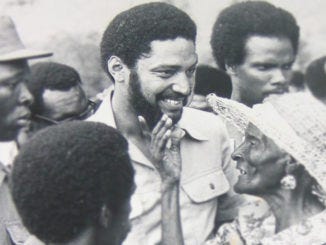 Grenadian Prime Minister Maurice Bishop with a woman of the Carriacou island. Grenadian Prime Minister Maurice Bishop with a woman of the Carriacou island.