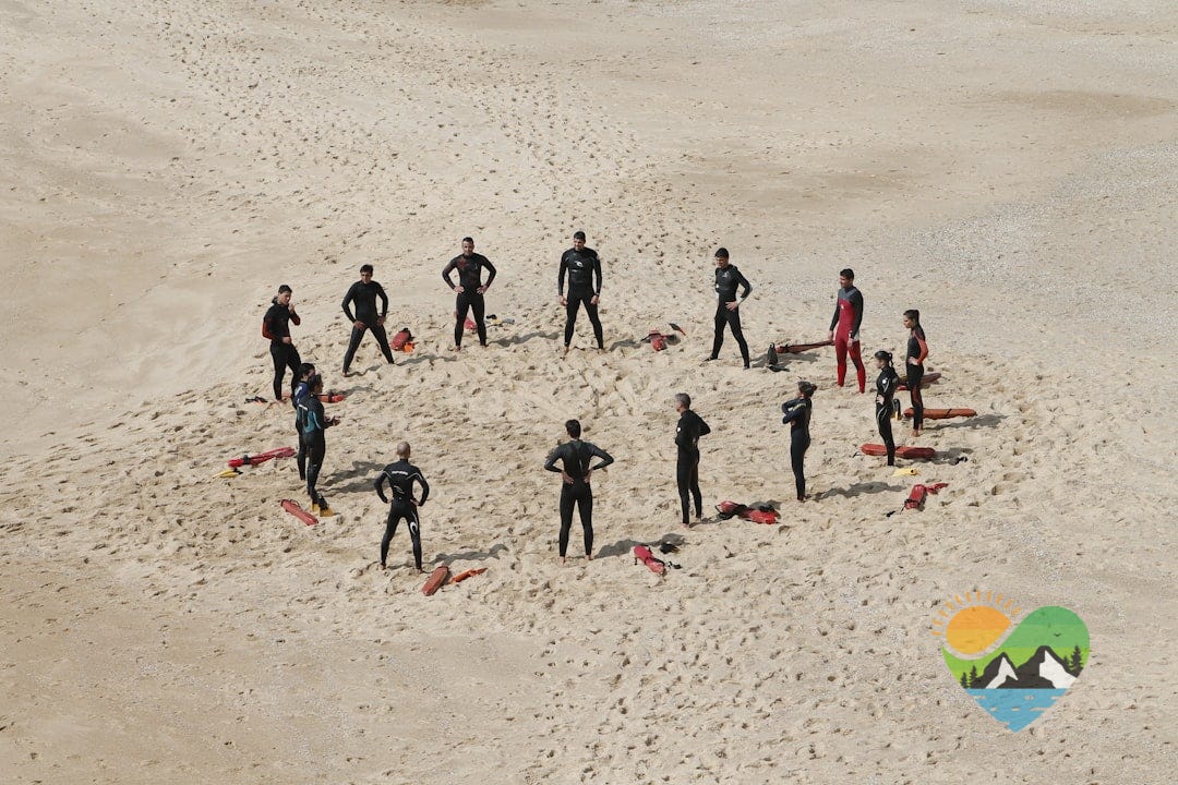 people standing forming a circle during daytime