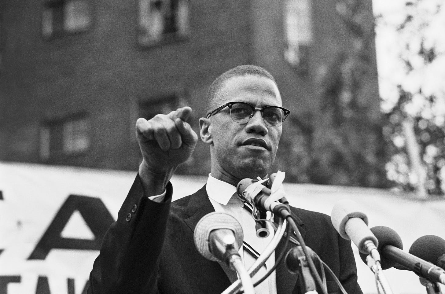 https://api.time.com/wp-content/uploads/2020/02/malcolm-x-speech.jpg https://api.time.com/wp-content/uploads/2020/02/malcolm-x-speech.jpg