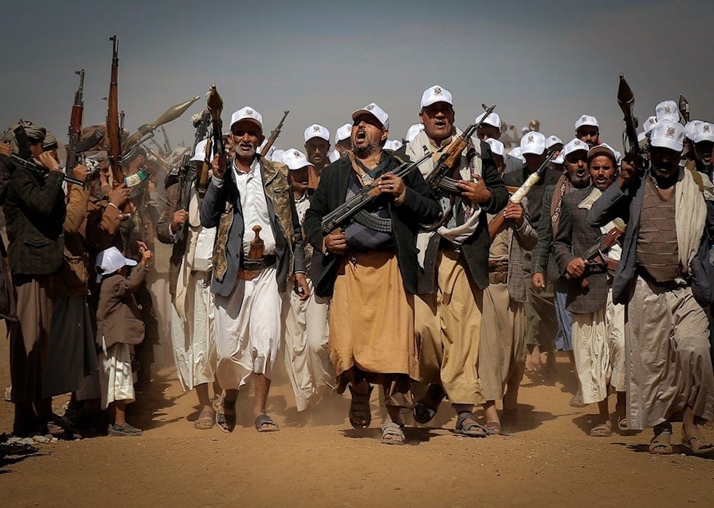 Ansar Allah fighters march during a rally of support for the Palestinians in the Gaza Strip and against the US strikes on Yemen outside Sanaa on Monday, January 22, 2024 (AP) Ansar Allah fighters march during a rally of support for the Palestinians in the Gaza Strip and against the US strikes on Yemen outside Sanaa on Monday, January 22, 2024 (AP)