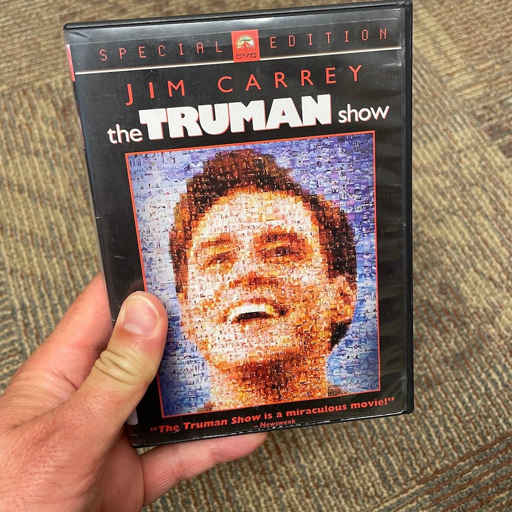 The DVD cover of The Truman Show, with Jim Carrey's face made up of tiny TV images The DVD cover of The Truman Show, with Jim Carrey's face made up of tiny TV images