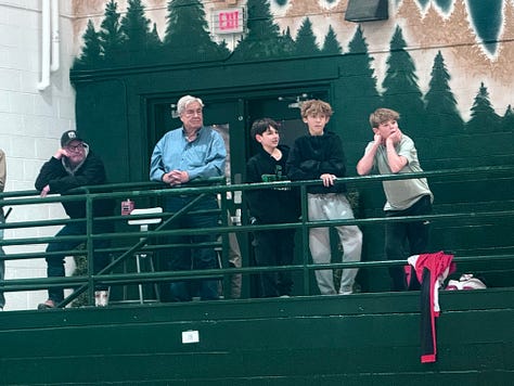 high school basketball gym tournament, spectators, crowd, players