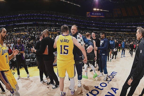 Austin Reaves of the Los Angeles Lakers and Joe Ingles of the Minnesota Timberwolves embrace after the game during Round One Game Five of the 2025... Austin Reaves of the Los Angeles Lakers and Joe Ingles of the Minnesota Timberwolves embrace after the game during Round One Game Five of the 2025...