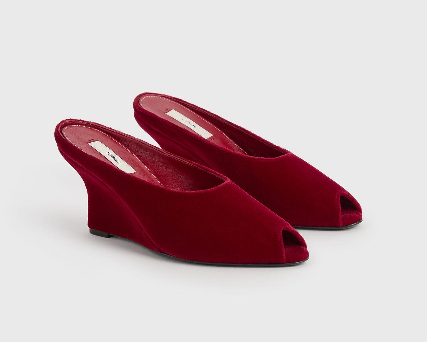 Peep-toe velvet wedge mules red