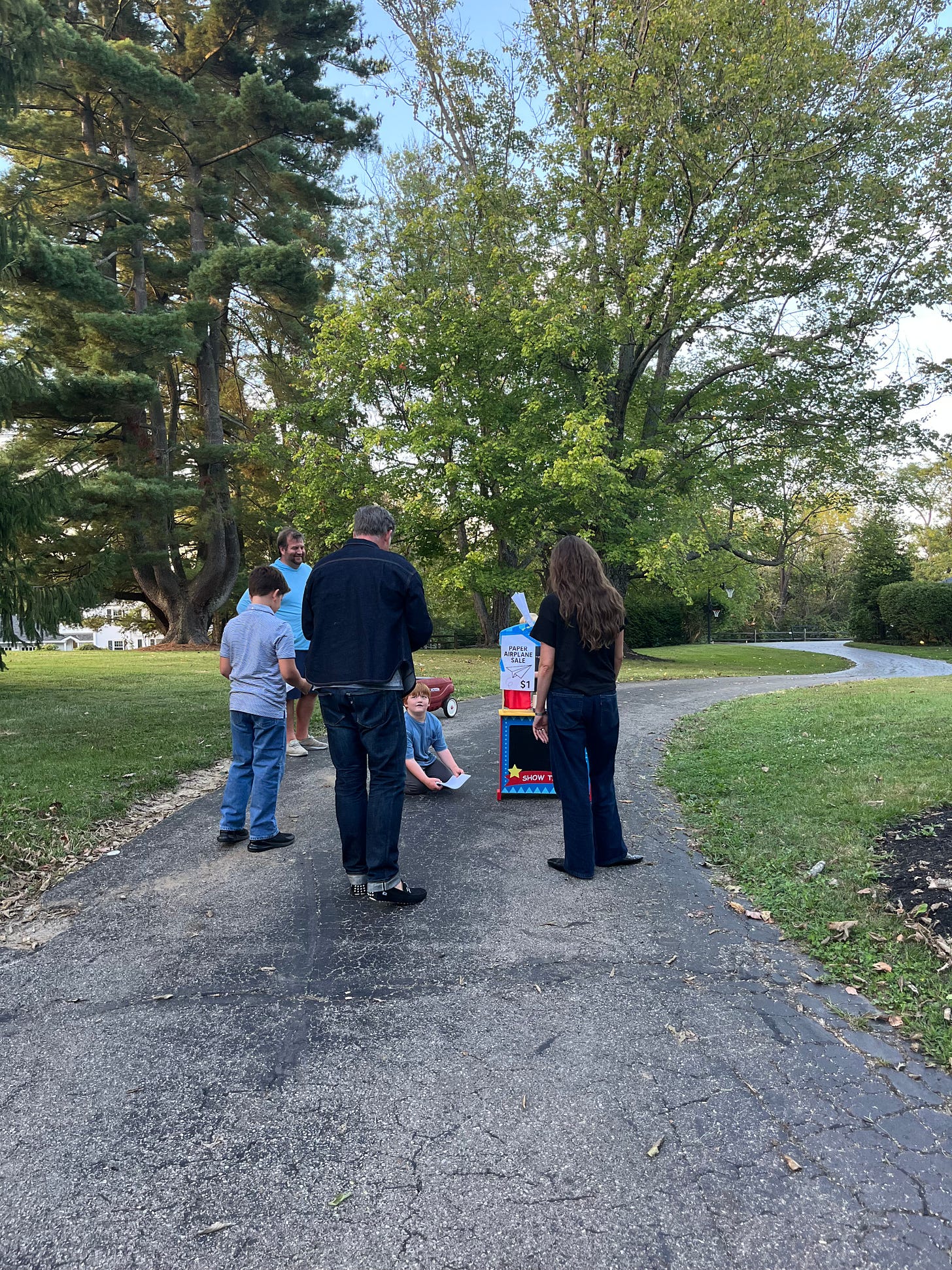 A young boy turns scrap paper into a $20 startup by selling handmade airplanes—showing the spirit of creativity, hustle, and imperfect forward progress in entrepreneurship.