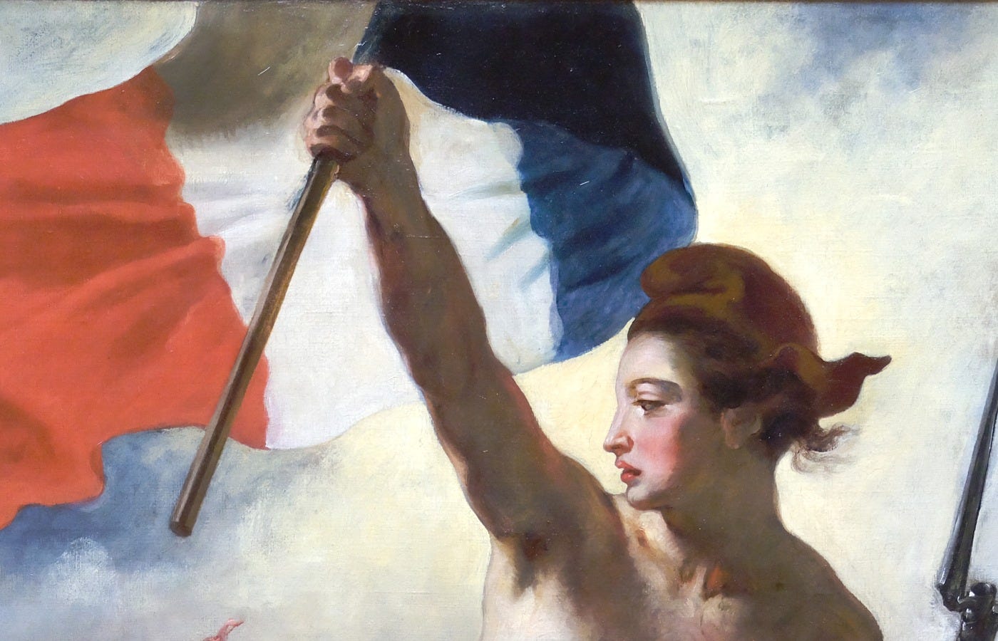 Detail of Liberty's red Phrygian cap and the French tricolor flag in Delacroix's Liberty Leading the People.