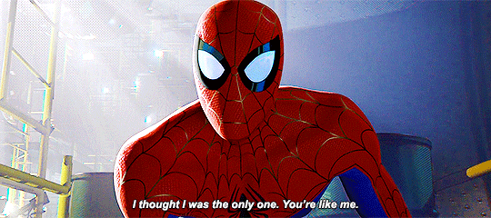 The comic superhero, Spiderman in his red suit with black spiderweb threads squinting while saying, "I thought I was the only one. You're like me."