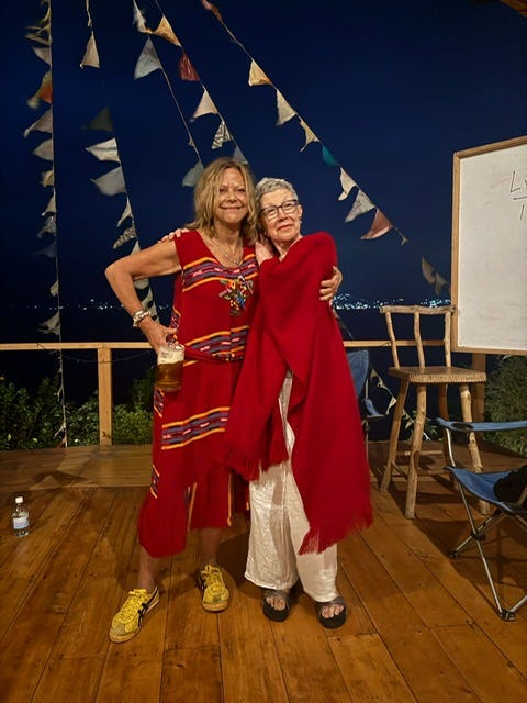 Two septuagenarian sisters in red