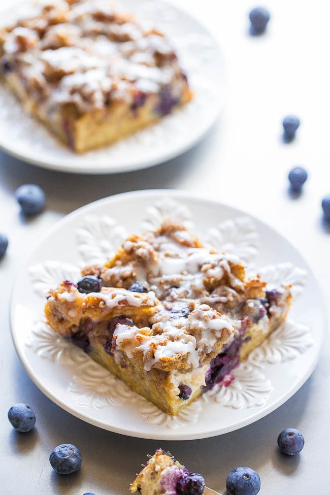 Overnight Blueberry Waffle Breakfast Bars - Blueberry waffles layered with cream cheese, blueberries, streusel, a glaze, and more for one of the BEST breakfasts ever!! It's dessert for breakfast! Assemble it the night before for a mindlessly easy and AMAZING breakfast or brunch!! Overnight Blueberry Waffle Breakfast Bars - Blueberry waffles layered with cream cheese, blueberries, streusel, a glaze, and more for one of the BEST breakfasts ever!! It's dessert for breakfast! Assemble it the night before for a mindlessly easy and AMAZING breakfast or brunch!!