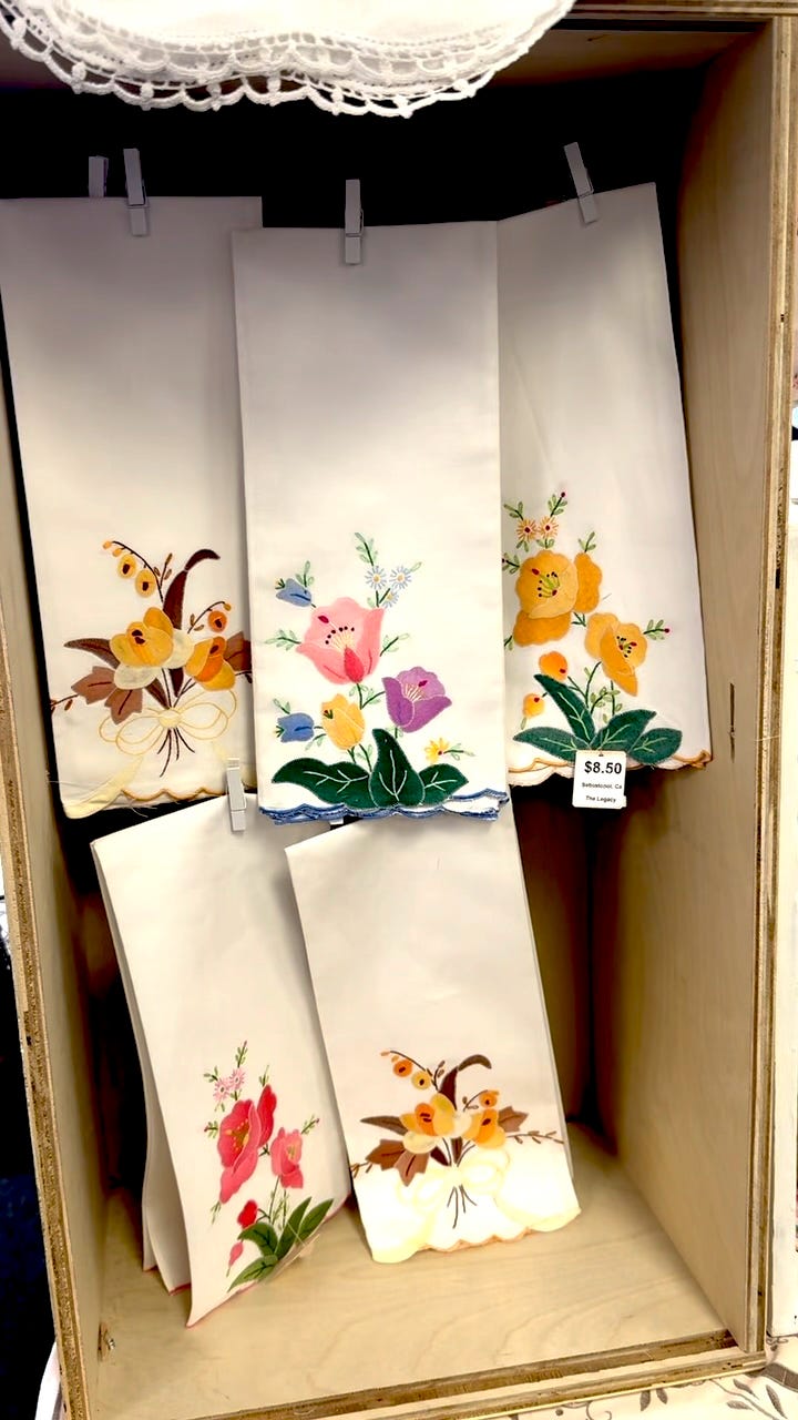 A display of button and vintage linens