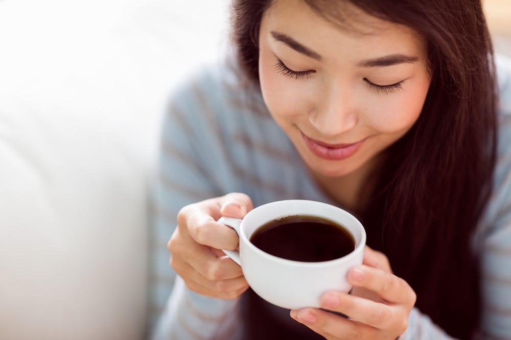 woman enjoying a morning coffee. woman enjoying a morning coffee.
