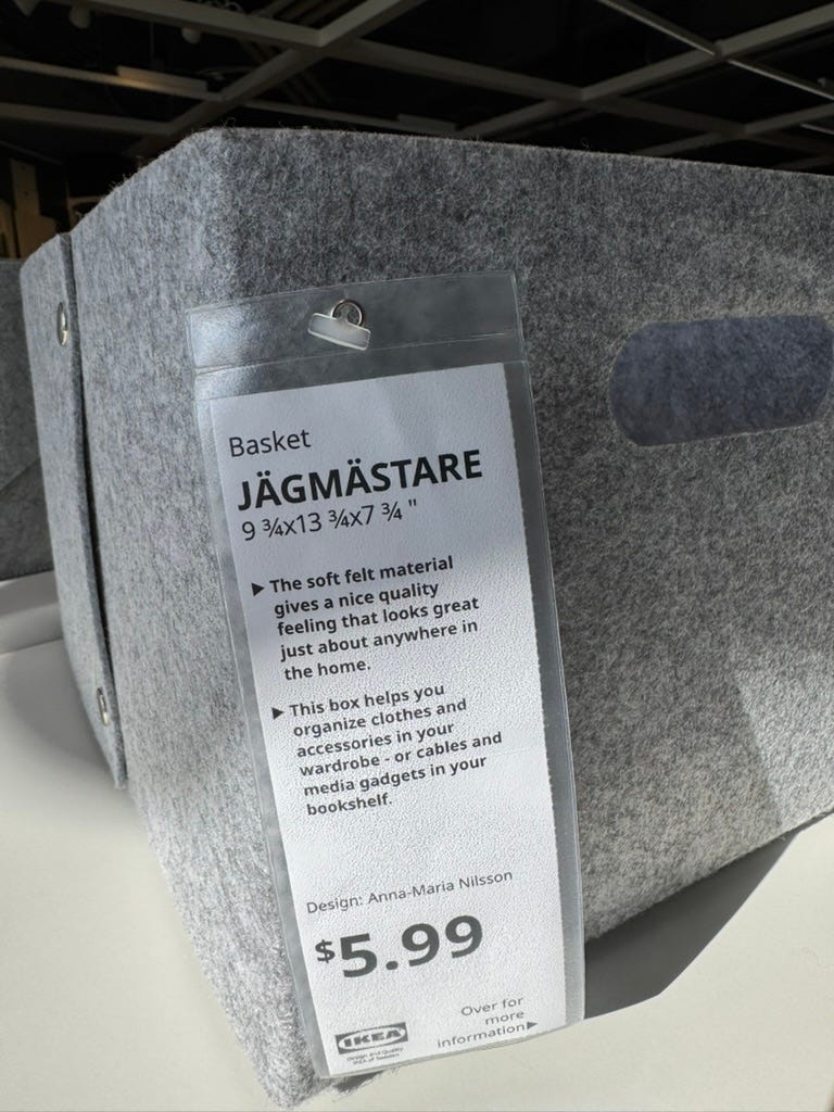 A grey felt box from IKEA with the product name JÄGMÄSTARE