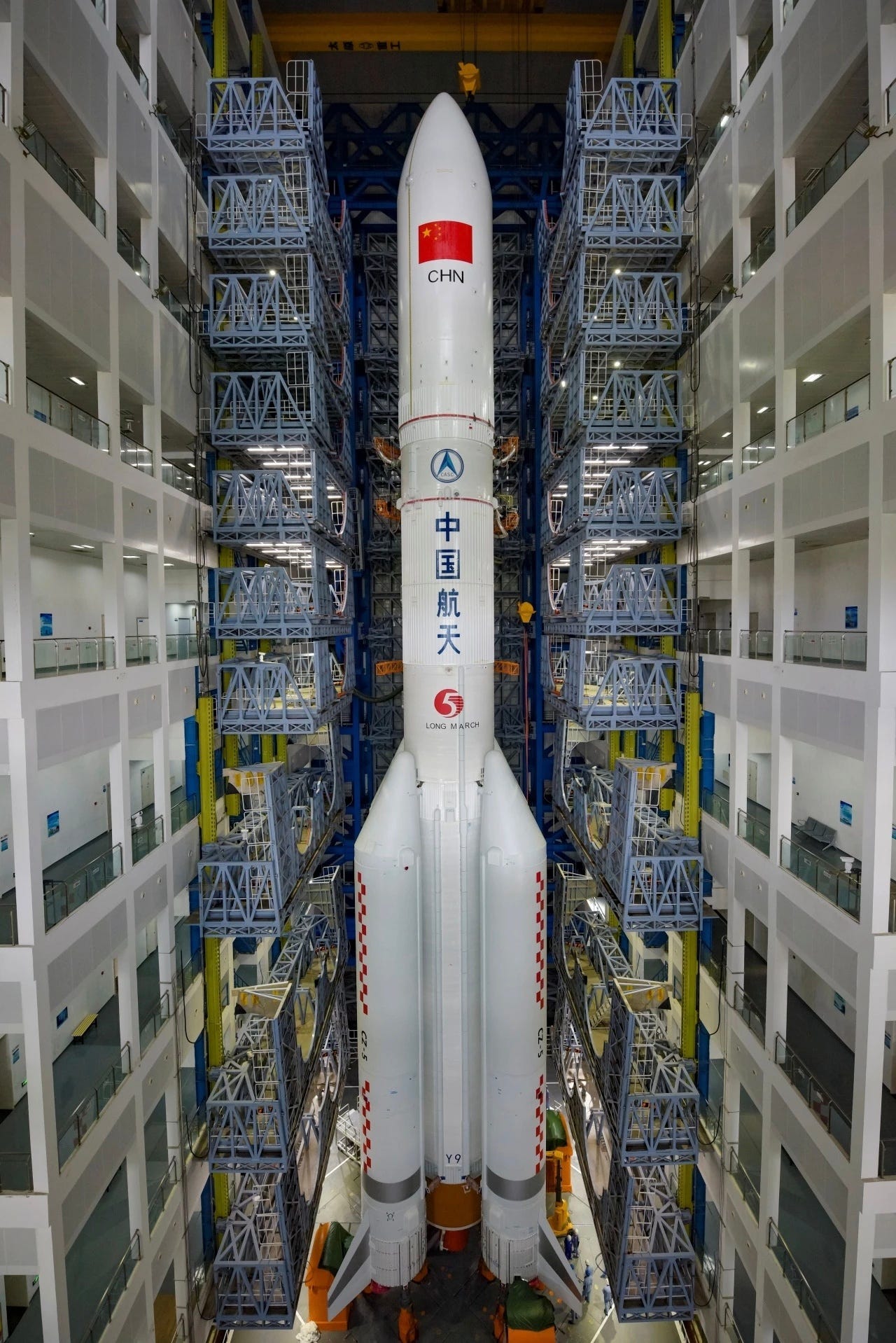 The Long March 5 Y9 vehicle inside the vehicle assembly building at the Wenchang Space Launch Site before being rolled out to Launch Complex 101. The Long March 5 Y9 vehicle inside the vehicle assembly building at the Wenchang Space Launch Site before being rolled out to Launch Complex 101.