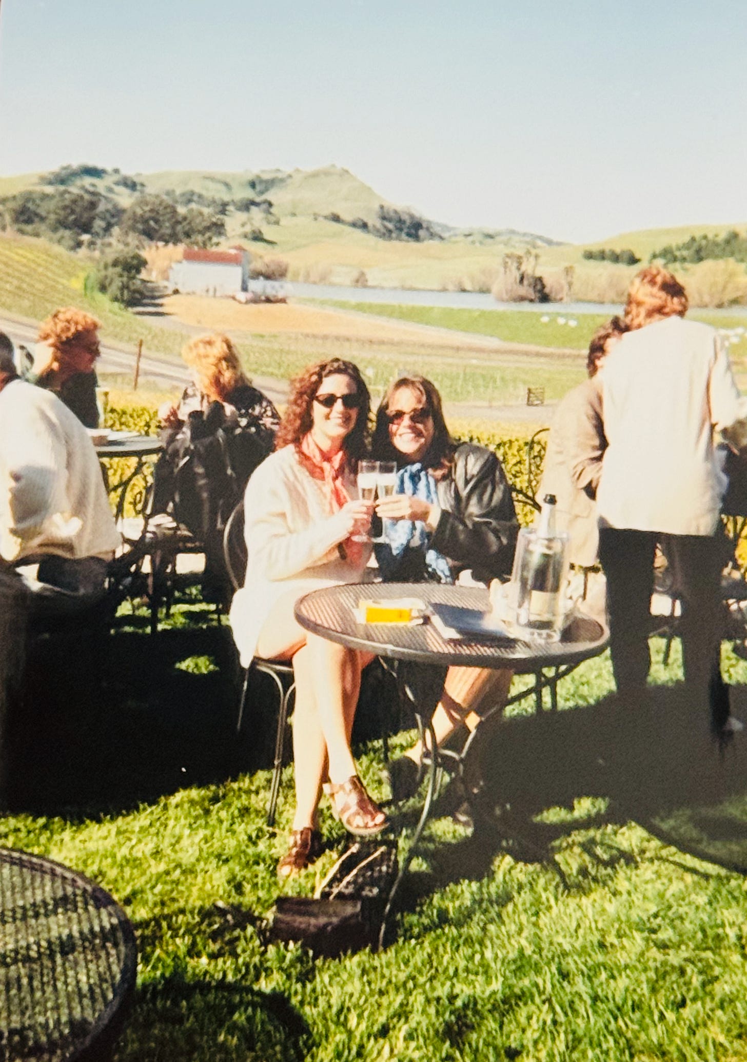 Friends at a table, wine tasting, in Sonoma California, in the 1990's. Friends at a table, wine tasting, in Sonoma California, in the 1990's.