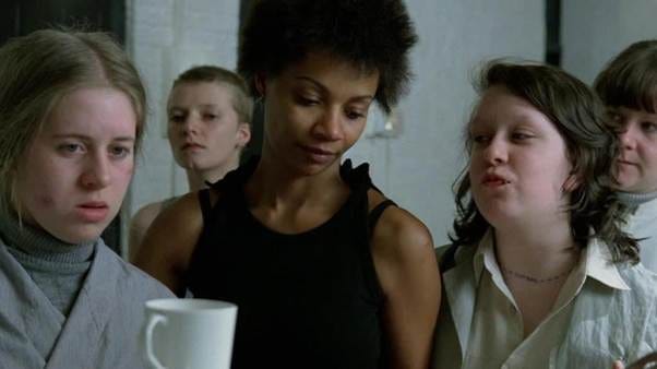 A group of women looking down at a white mug

AI-generated content may be incorrect.