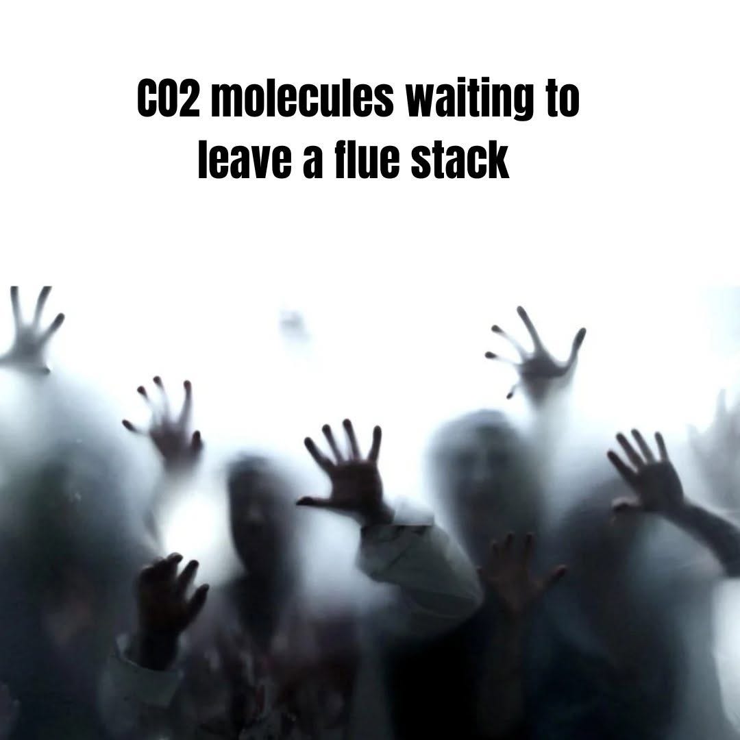 Zombie hands and faces pressing against fogged glass, under the text "CO2 molecules waiting to leave a flue stack".