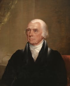 A man in formal dress and a colonial hairstyle. A man in formal dress and a colonial hairstyle.