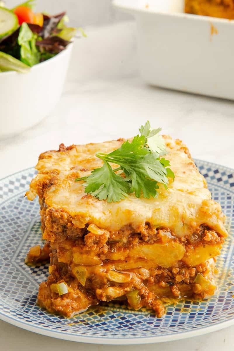 A serving pastelón cut to show the layers. A serving pastelón cut to show the layers.