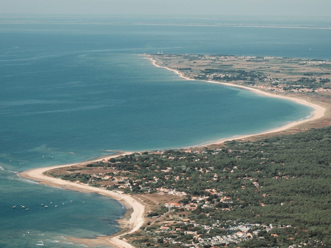 a beach with blue water
