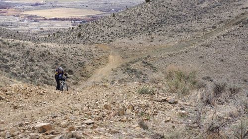 Ross climbs from the parking lot