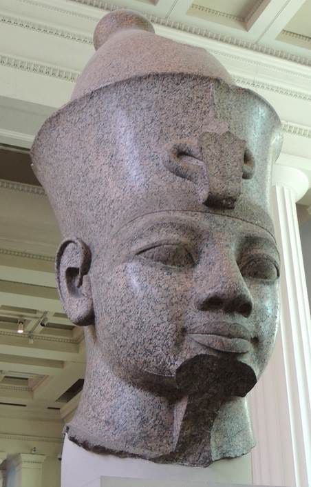 A statue of a person

AI-generated content may be incorrect.