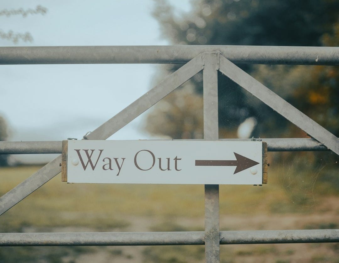 white and black no smoking sign