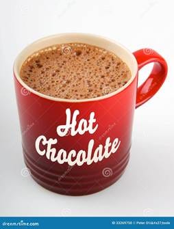 A red mug with a drink in it

Description automatically generated