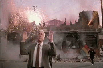 Frank Drebin saying 'nothing to see here' with explosions in the background.