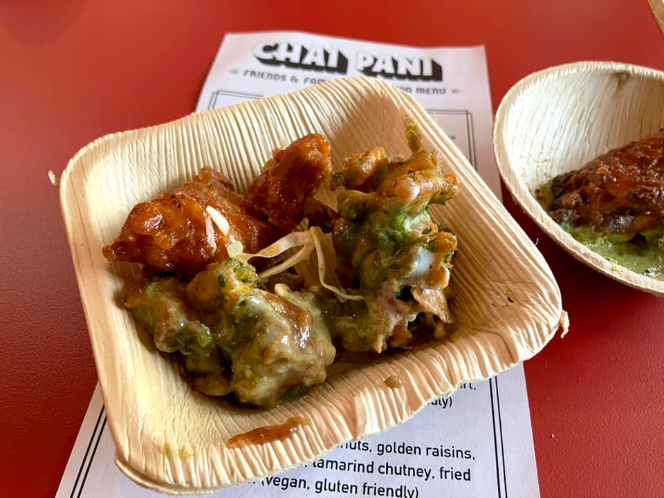 May be an image of ‎dim sum and ‎text that says '‎FRIENDS & FRIENDS&F רראחת የባር CHAY S an MENU nuts, golden raisins, amarind chutney. fried .¡vegan, gluten friendlv)‎'‎‎